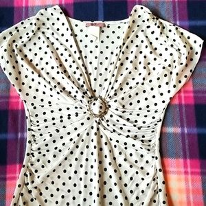 White and black polka dot blouse